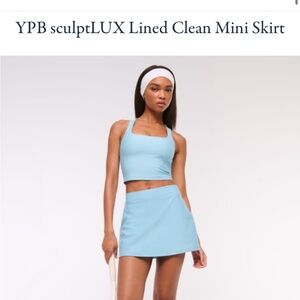YPB sculptLUX Lined Clean Mini Skort/Skirt size XS in blue topaz NWT